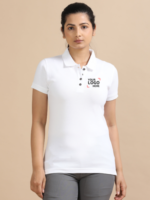 Woman wearing white custom logo polo shirt and gray pants, front view