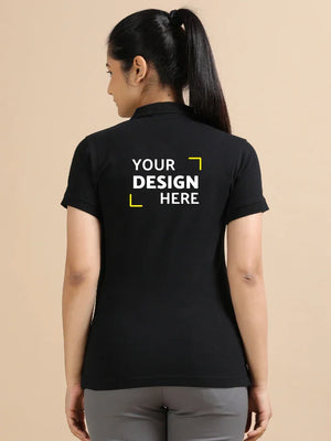 Woman wearing black custom polo T-shirt with 'Your Design Here' text on back