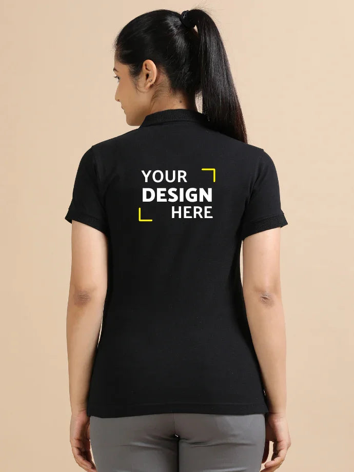 Woman wearing black custom polo T-shirt with 'Your Design Here' text on back
